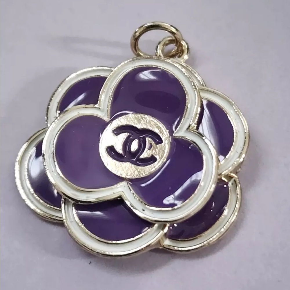 CHANEL STUNNING FLORAL PURPLE STAMPED SILVER PENDANT